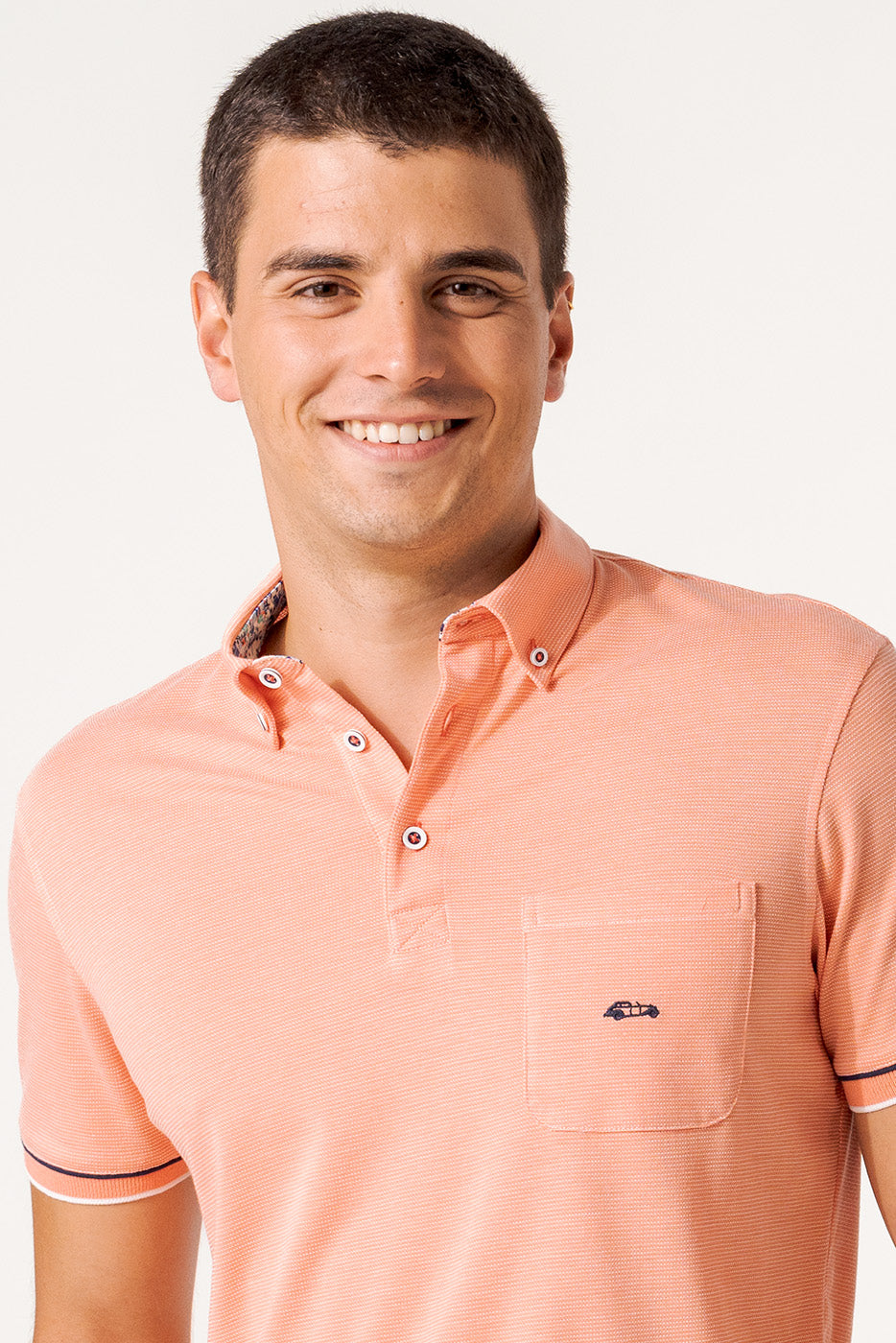 Polo jacquard en rayas color coral