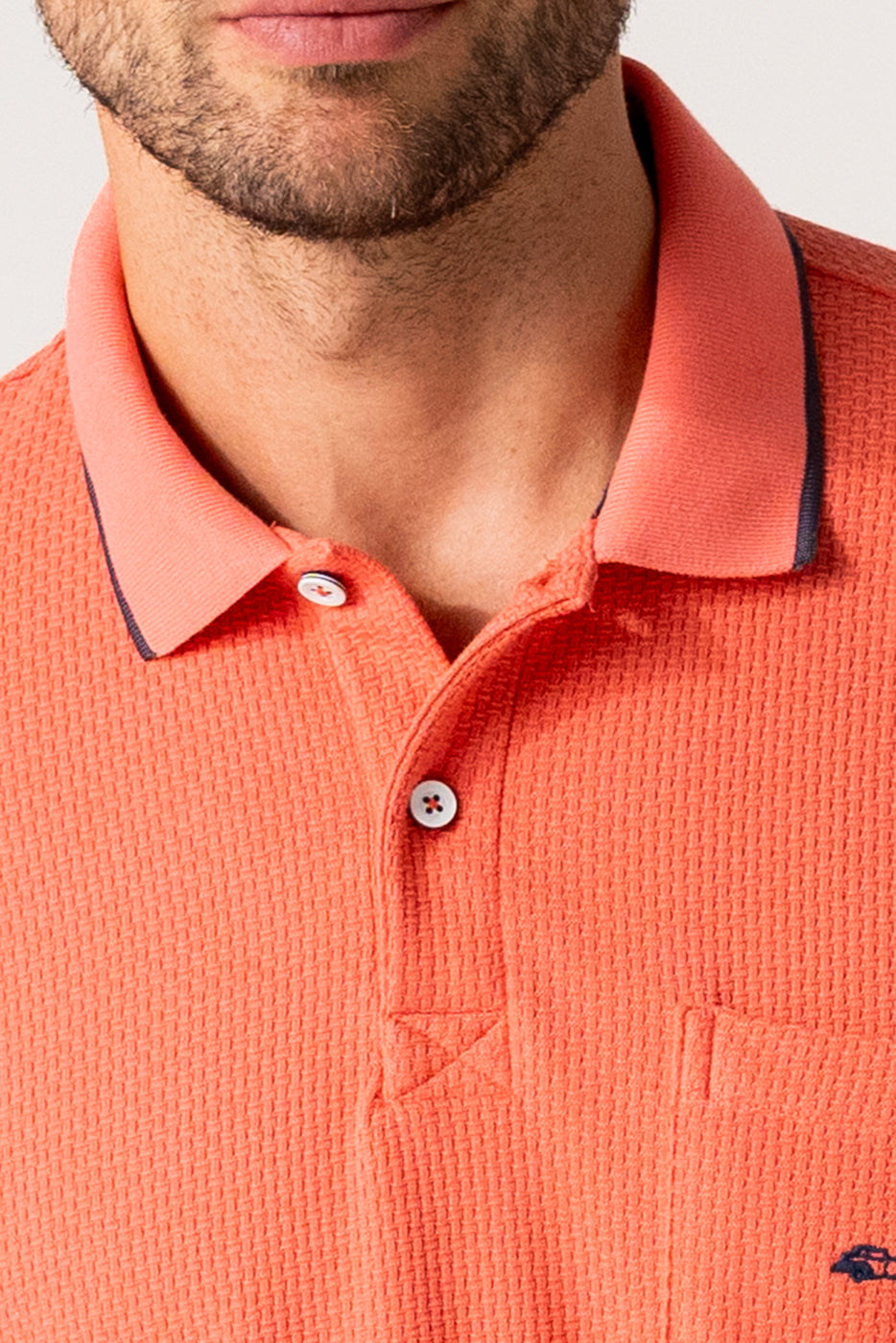 Polo liso hombre coral manga corta