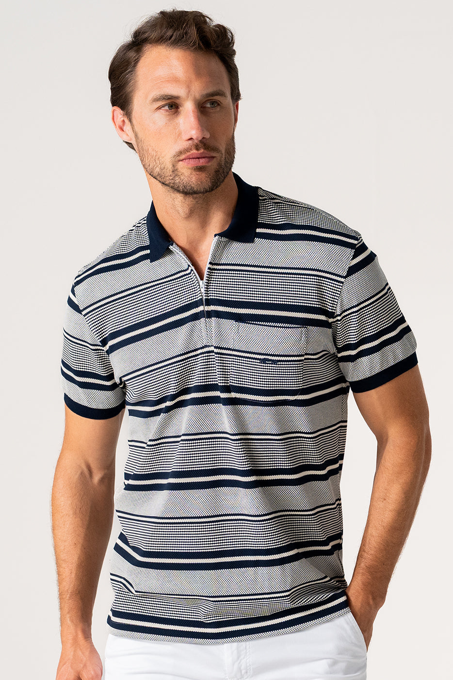 Polo tejido jacquard con cremallera cuello rayas negro