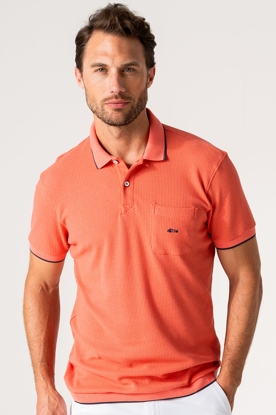 Polo liso hombre coral manga corta