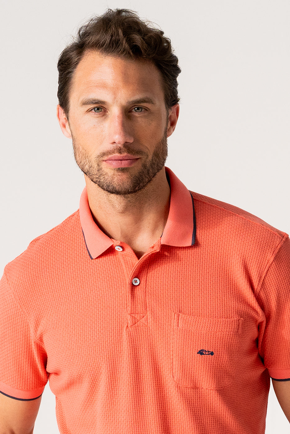 Polo liso hombre coral manga corta
